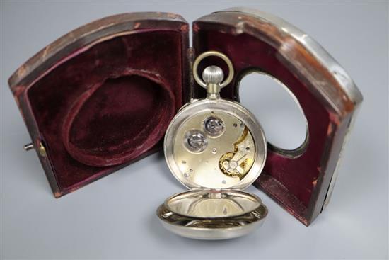 An Edwardian planished silver mounted travelling watch case, with pocket watch, Henry Matthews, Birmingham, 1905, 11.6cm.